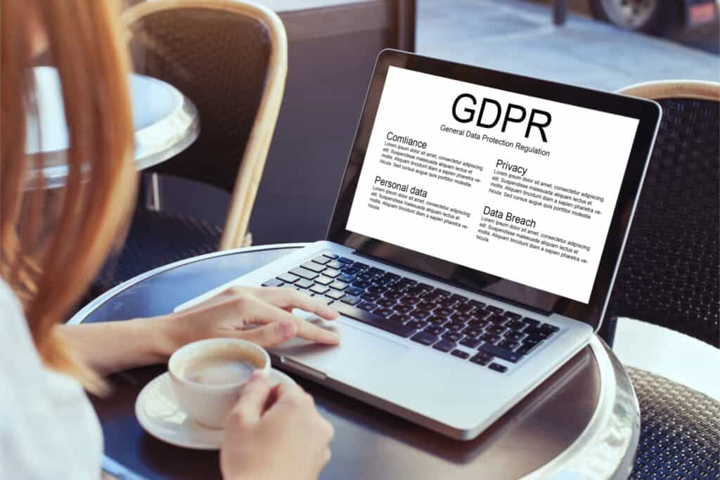 GDPR concept woman reading about General Data Protection Regulation private information